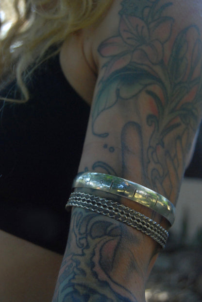 stamped upper arm cuff