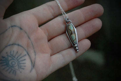 Turquoise dagger pendant